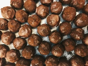 A plate of homemade peanut butter chocolate balls