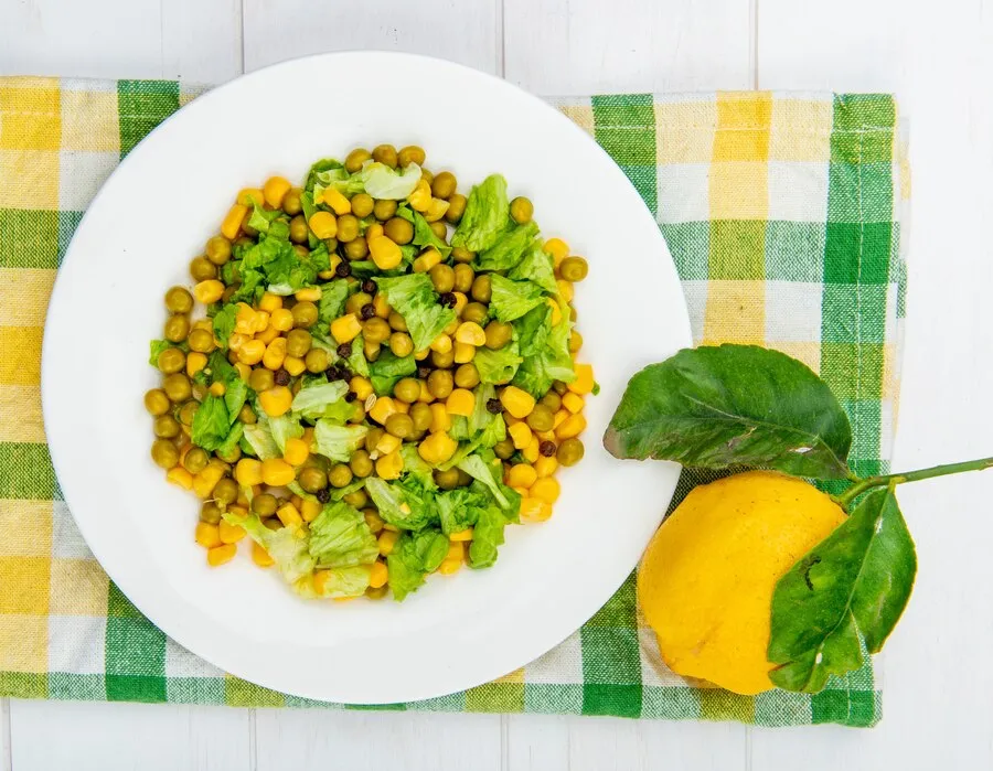 Healthy escarole and beans in a traditional serving dish.