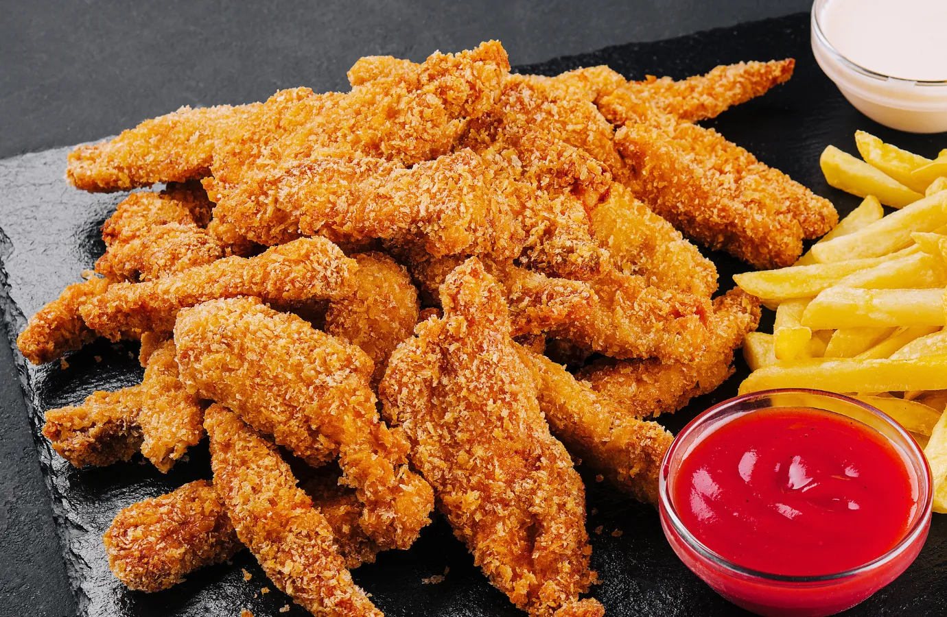 Crispy Chicken Tenders Served with Dipping Sauces