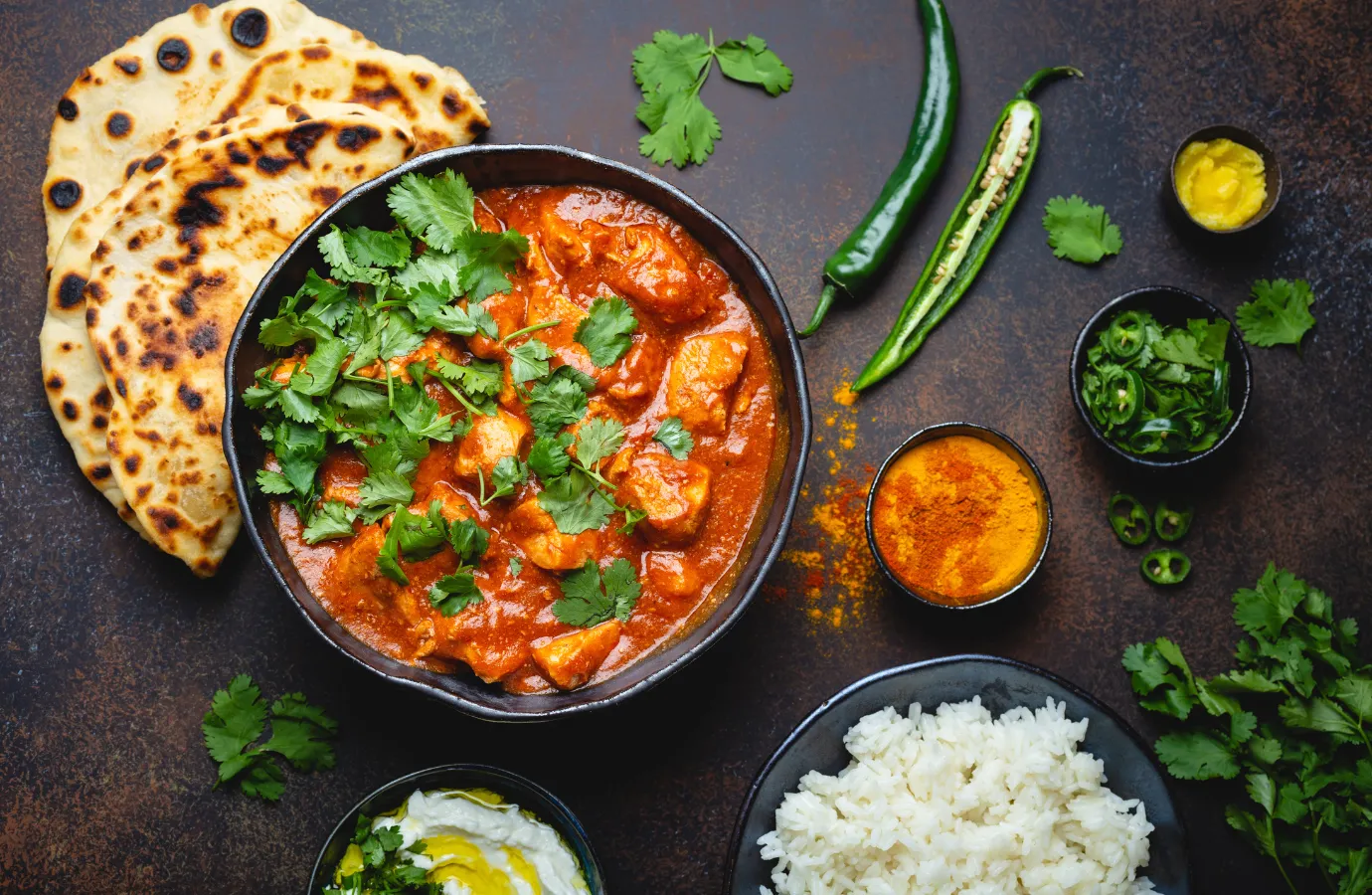 Side-by-side comparison of Chinese and Indian curry dishes.