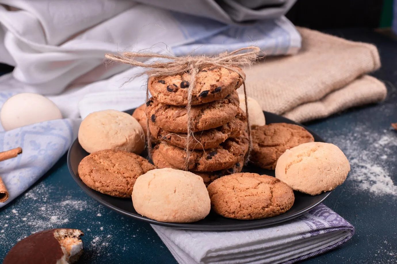 A baker measuring flour accurately with a kitchen scale, showcasing precision in baking.