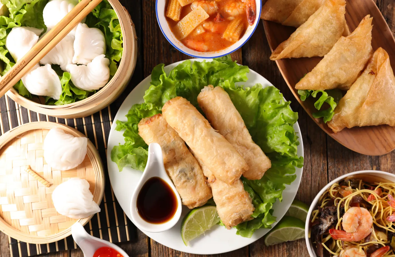 Assorted spring rolls representing Chinese and Thai cuisine.